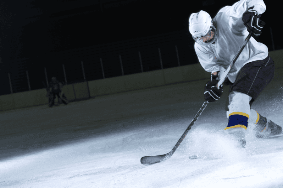 Ice hockey player enjoying fast game of hockey